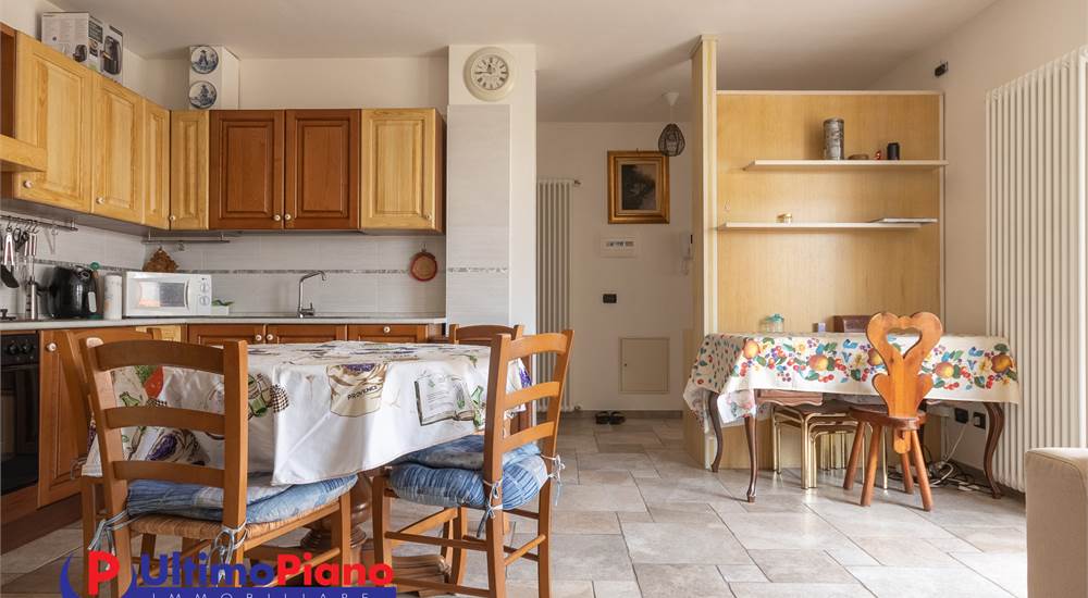 zona giorno con angolo cottura