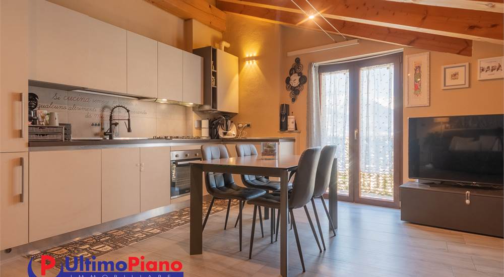 soggiorno con angolo cottura