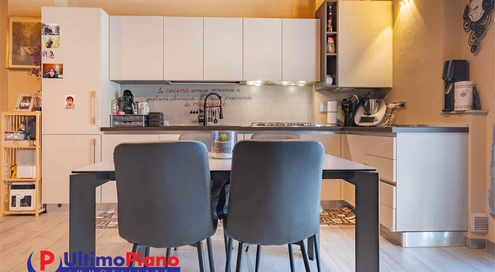 soggiorno con angolo cottura