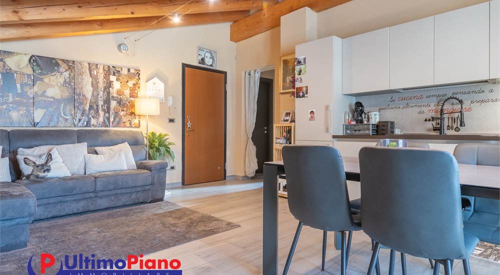 soggiorno con angolo cottura