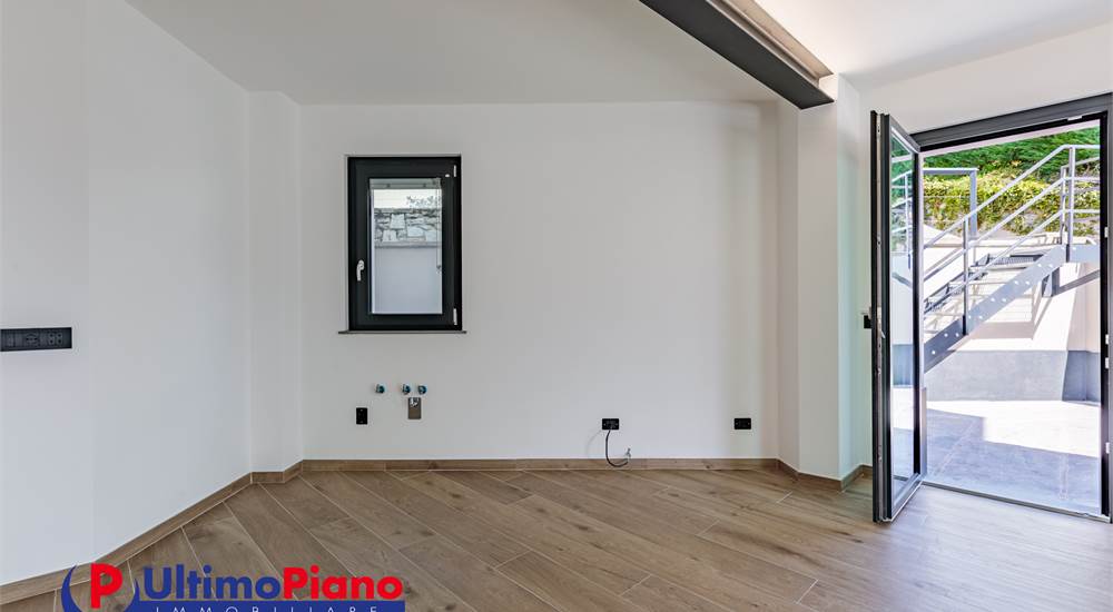 SOGGIORNO CON ANGOLO COTTURA PIANO TERRA